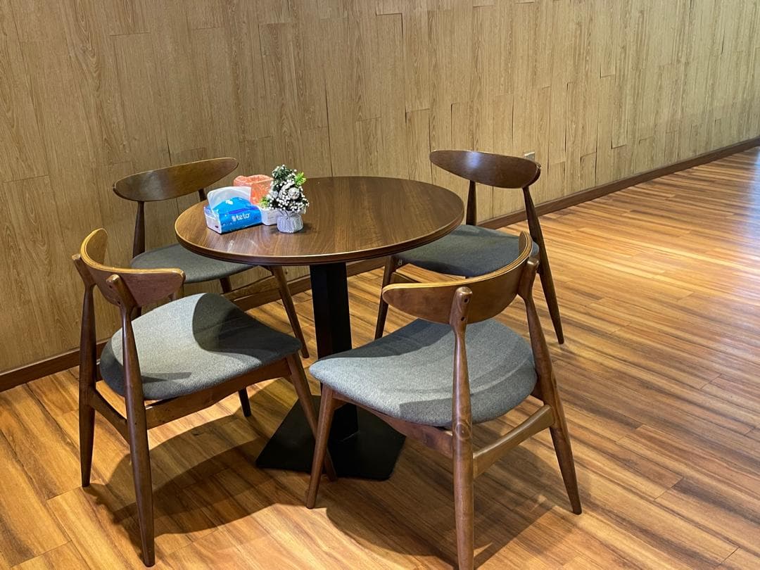 Table and seating area for customers at SIFU CERMIN Senawang HQ